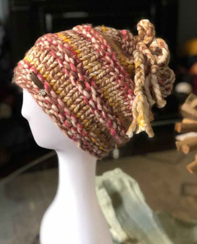 The Bushwick Convertible Hat - Alas the hat that turns into neckwear. This piece can be worn as a slouchy hat or a neck piece. Simply loosen the drawstring and slide the Bushwick convertible over your head for a cool neck piece.